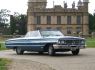 A 1962 Ford Galaxie 500 Convertible arriving at Knebworth